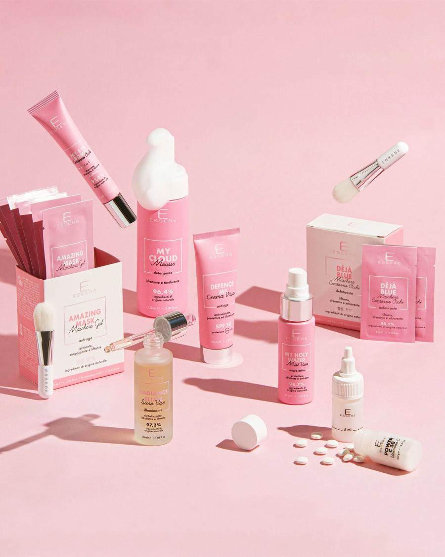 Flaconi Essere Bio su fondo rosa