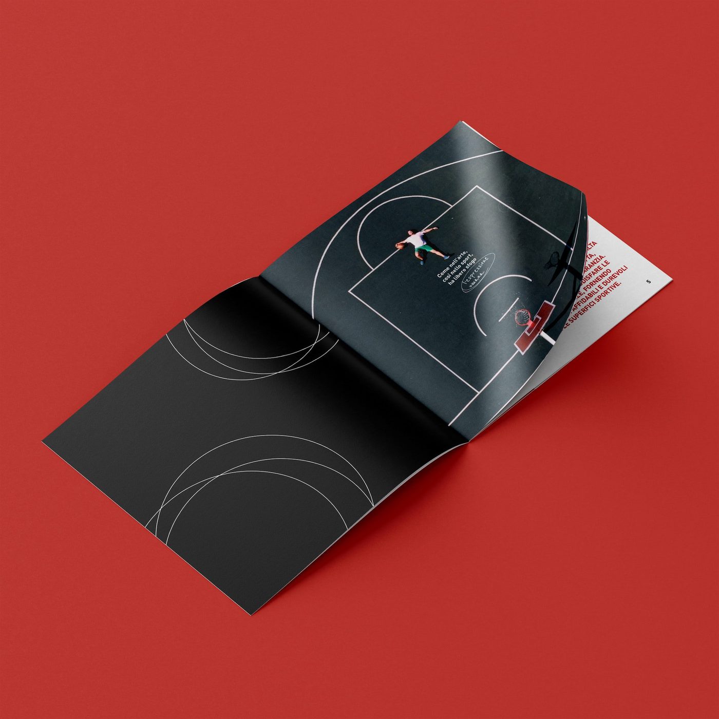 Una brochure nera Abstract Sport aperta su fondo rosso
